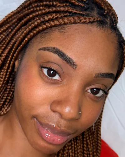 Close-up of a client's hairstroke brows
